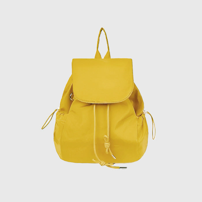 Close-up of Check Mate Mini Backpack in yellow, easy for commuting and weekends.