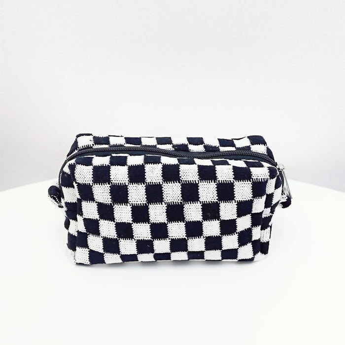 Classic black and white checkerboard knit bag; durable woven cosmetic pouch for timeless aesthetic fashion.
