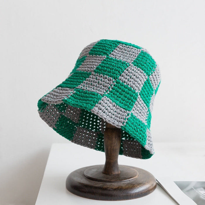 Front view of green checkered crochet bucket hat, made from soft and durable polyester-cotton.