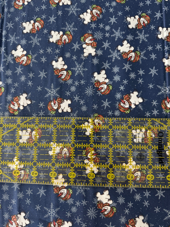 Cheery Snowmen on Ice Skates on Blue 100% Cotton Fabric