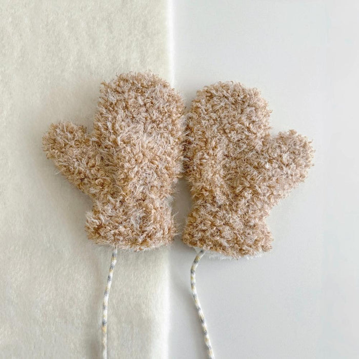 Khaki cloud-touch fluffy gloves with plush texture and ribbed cuff; warm comfort for cold days.