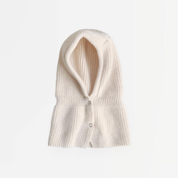 Front view of beige balaclava hat with multi-tone patterns, offering a sophisticated winter headwear look.