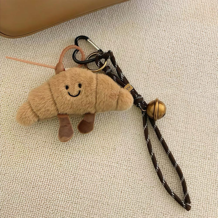 Close-up of Croissant Bag Charm, ideal for travel and daily use.