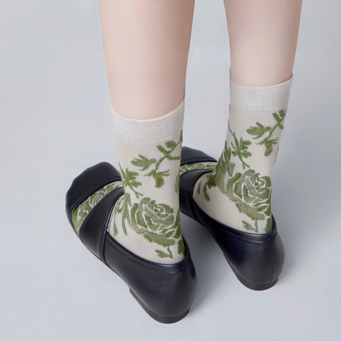 Angled view of Floral Embroidered Socksin celadon, great for daily wear and lounging.