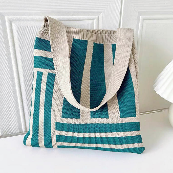 Folded view of Geometric Line Knitted Bag in viridian, easy for commuting and weekends.