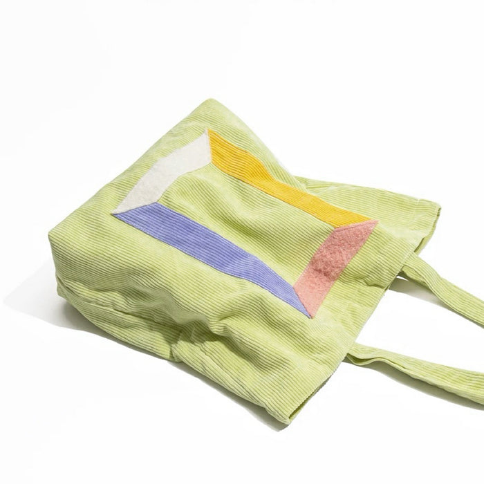Detail view of Hued Panel Corduroy Tote Bag, ideal for errands and gifting.