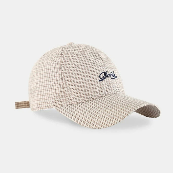 Front view of apricot Plaid Chill Cap, features traditional plaid motifs in a warm, versatile neutral tone.