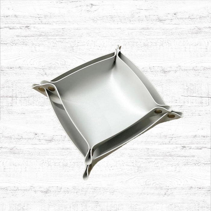 Close-up of PU Leather Tray storage organizer in gray, easy for travel packing and storage.