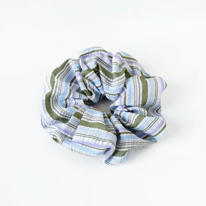 Folded view of Stripe Dream Scrunchie in blue, ideal for quick updos and ponytails.