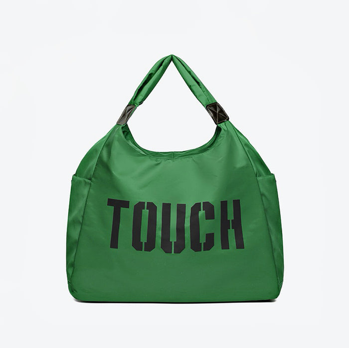 Front view of Touch Nylon Weekend Bag in green, ideal for errands and gifting.