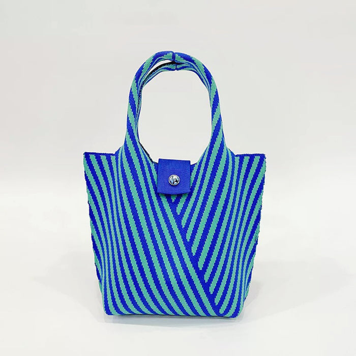 Folded view of Vintage Striped Knitted Handbag in blue, easy for commuting and weekends.