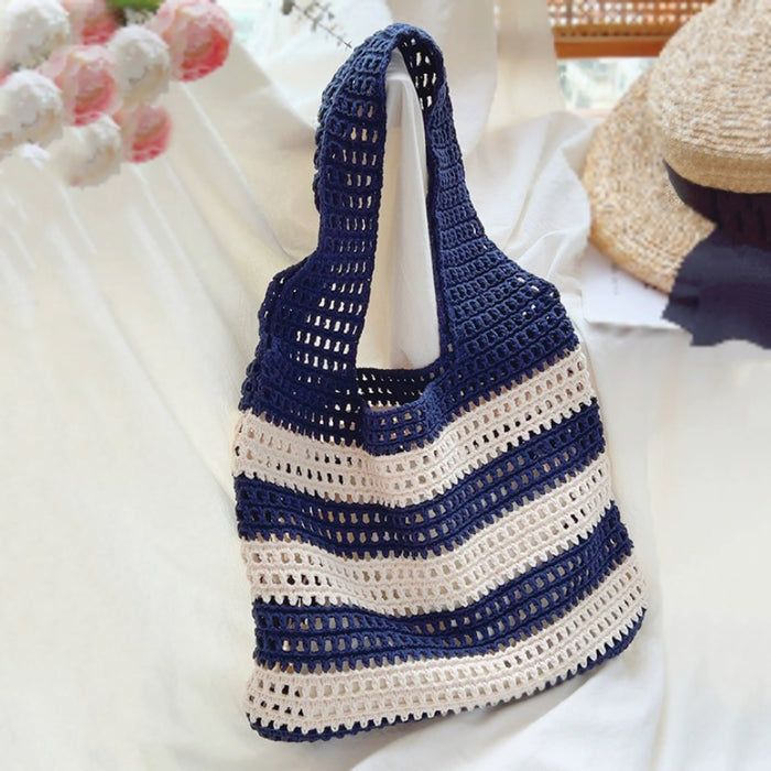 Close-up of Wide Stripe Crochet Bag in navy blue, easy for commuting and weekends.