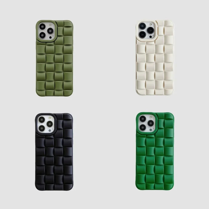 Four 3D plaid silicone iPhone cases in olive green, cream, black, and emerald green. Trendy textured mobile covers.