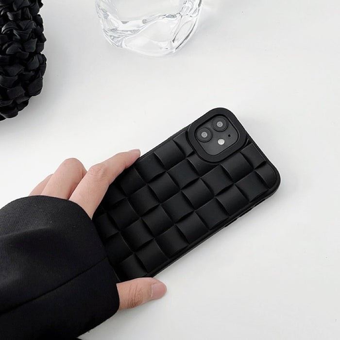 Model holding 3D Plaid Phone Case in black. Sleek urban style accessory, perfect for professional office chic.