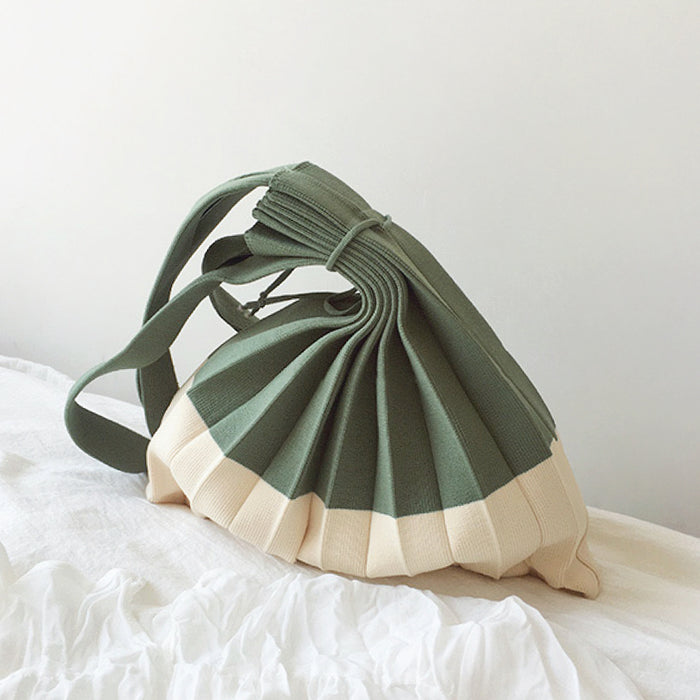 Folded view of Accordion Foldable Knitted Bag in forest green, easy for commuting and weekends.