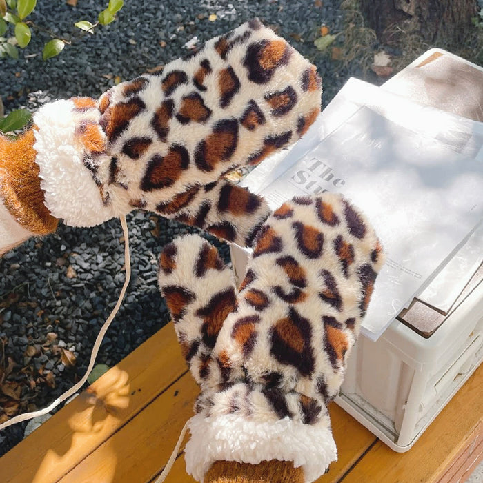 Light leopard print fluffy gloves with plush pile; cozy animal pattern for winter street style.