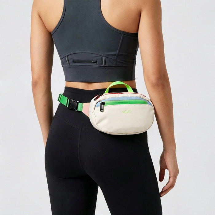 Back view of a model wearing the white AOIO belt bag as a waist pack.