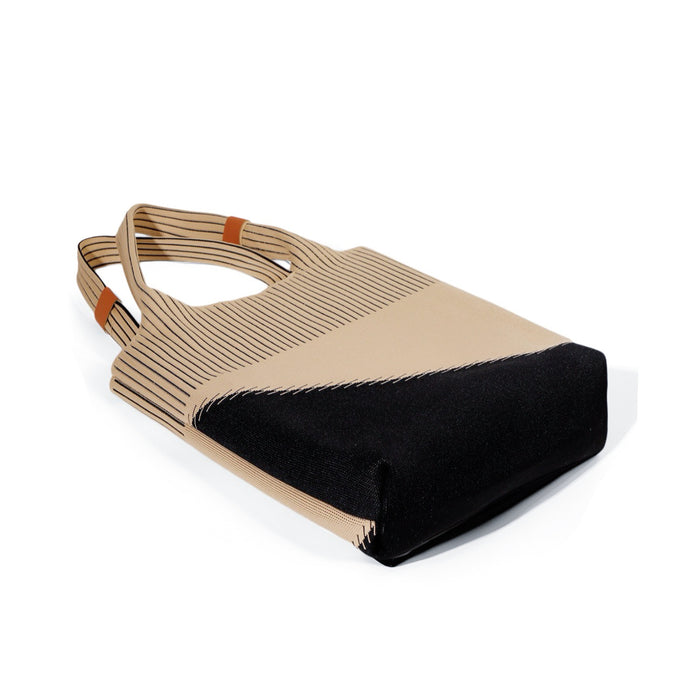 Flat lay view of khaki and black knitted tote bag presenting minimalist geometric look for urban city walks.