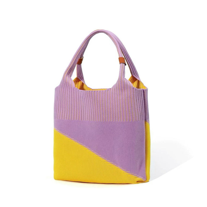 Vibrant purple and yellow version of knitted tote bag adding pop of color to spring picnics and casual dates.