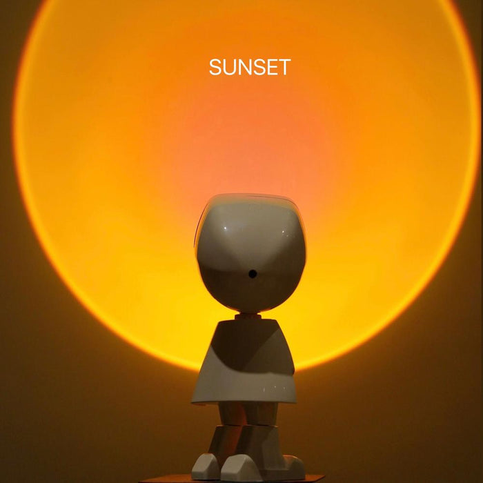 Astronaut lamp projecting a large, warm sunset glow on the wall for a romantic room vibe.