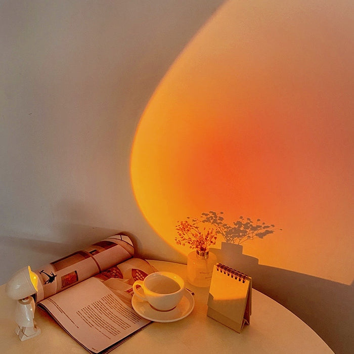 Mini astronaut sunset lamp used as a bedside night light and aesthetic room decor.
