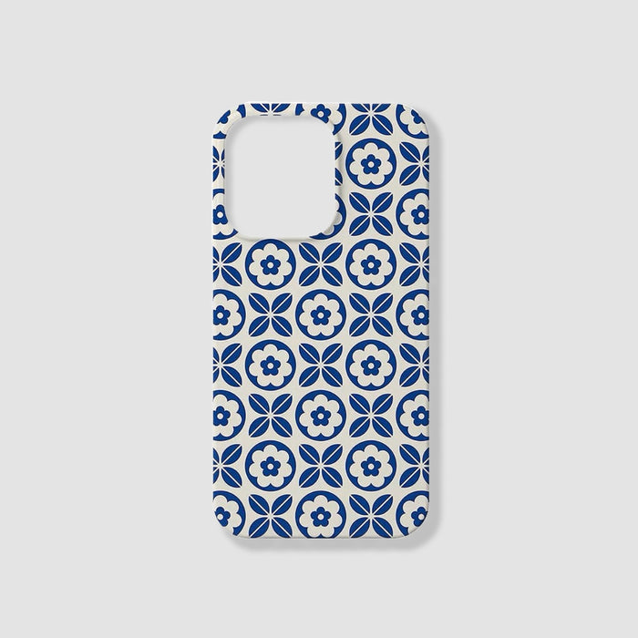 Silicone phone case with blue and white porcelain floral tile pattern. Chinoiserie aesthetic for iPhone.