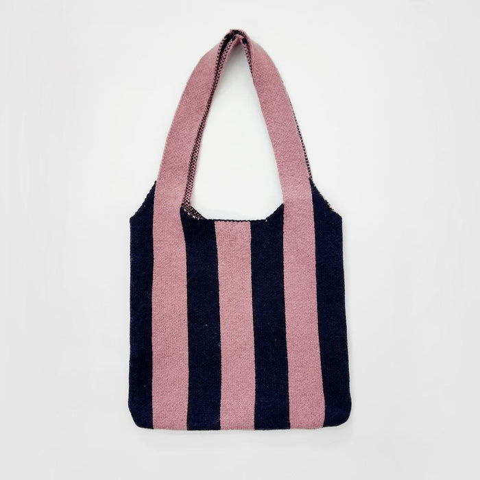 Front view of Pink and navy striped wool blend knit shoulder bag,  great for everyday carry and travel.