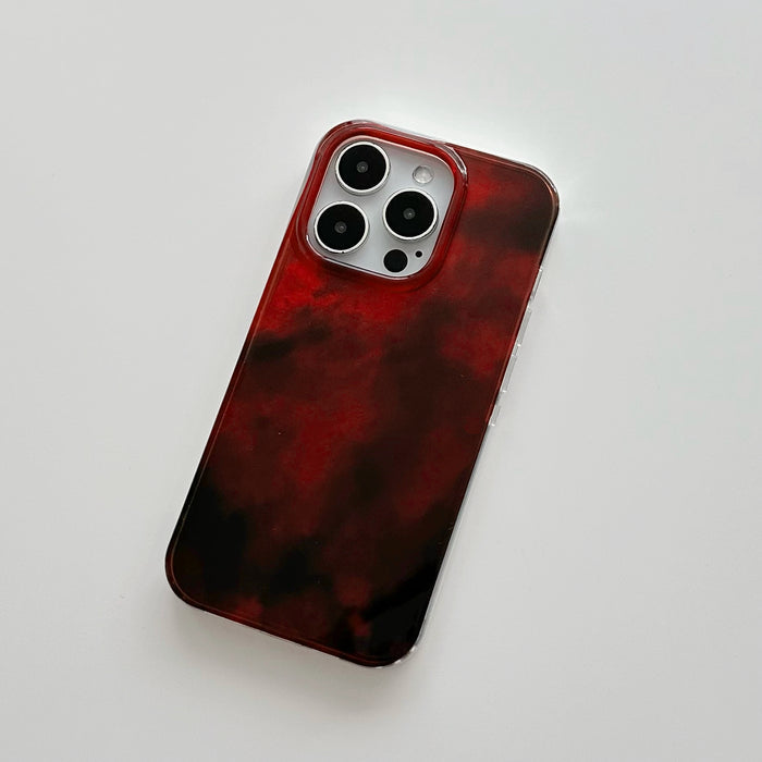 Front view of Burgundy Flux Case. High-gloss gradient effect on durable acrylic for a modern luxury look.