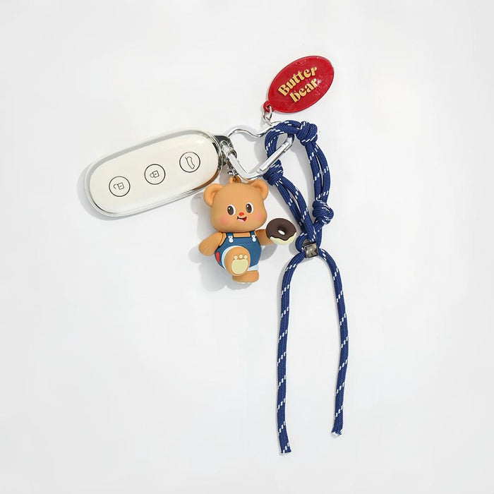Close-up of Butter Bear Bag Charm in blue, ideal for travel and daily use.