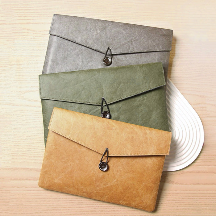 Front view of 3 colors of Buttoned Envelope Laptop Sleeve bag, ideal for errands and gifting.