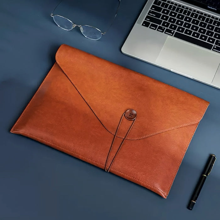 Folded view of Brown PU leather file folder with envelope-style flap, elastic loop, and button closure bag.