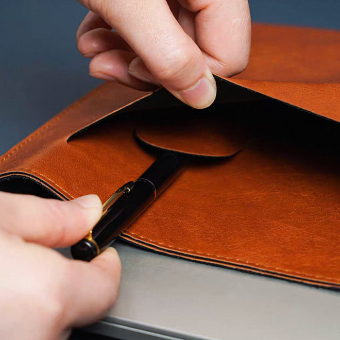 Detail view of brown Buttoned Leather File Folder.