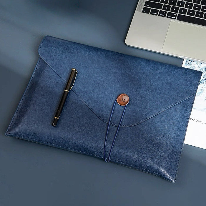 Folded view of Buttoned Leather File Folder bag in blue, ideal for errands and gifting.
