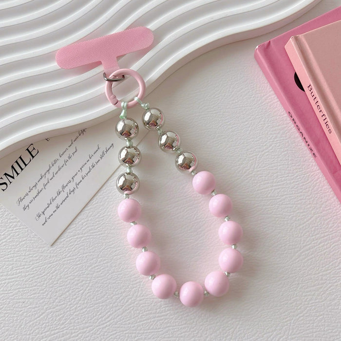 Front view of Candy Bead Phone Charm in pink, ideal for travel and daily use.