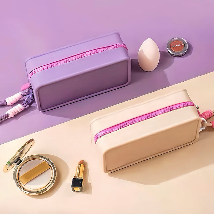 Top and side view of purple and khaki silicone cosmetic pouches displaying the smooth zip-top fastening.