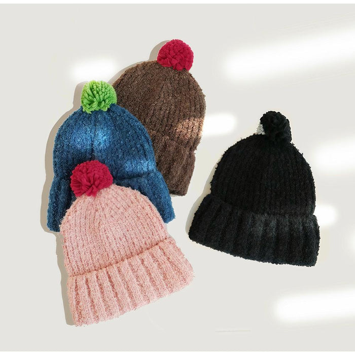 Front view of navy blue Candy Knitted Pompom Beanie. Playful 3D pompom on durable soft fabric.