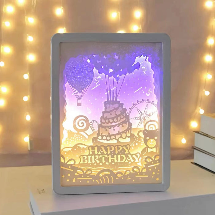 Front view of Carved Paper Lamp in birthday blessing pattern.