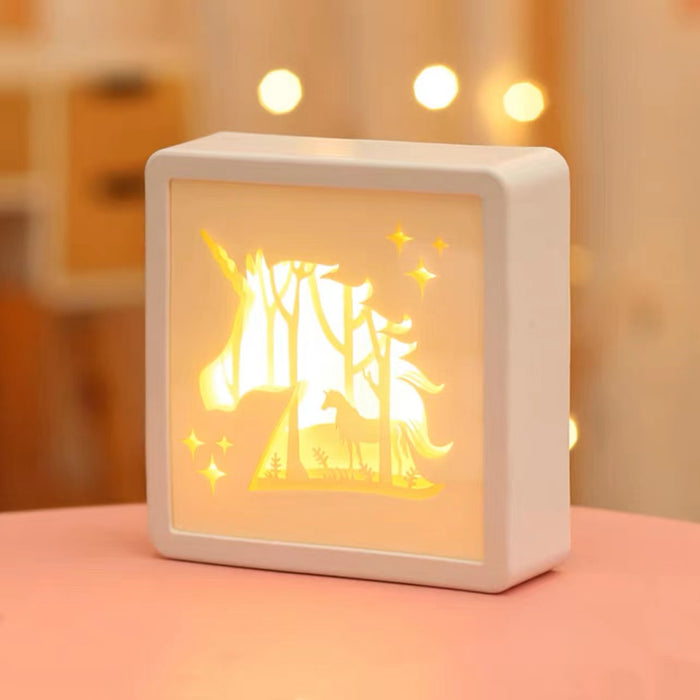Angled view of Carved Paper Lamp in unicorn pattern , great for home decor and gifting.