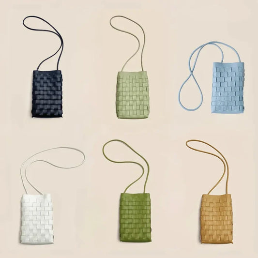 Front view of Six woven PU leather cassette crossbody bags in black, sage green, light blue, white, olive green.