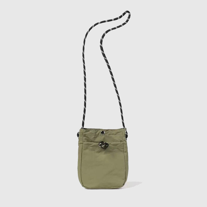 Close-up of a bag in  olive green, ideal for errands and gifting.