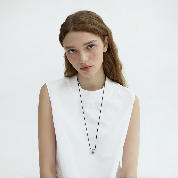 Model wearing a earrings Celestial Drop Pendant Necklace, great for parties, weddings, and dates.
