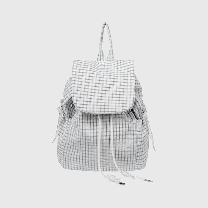 Close-up of Check Mate Mini Backpack in white, great for daily carry and travel.