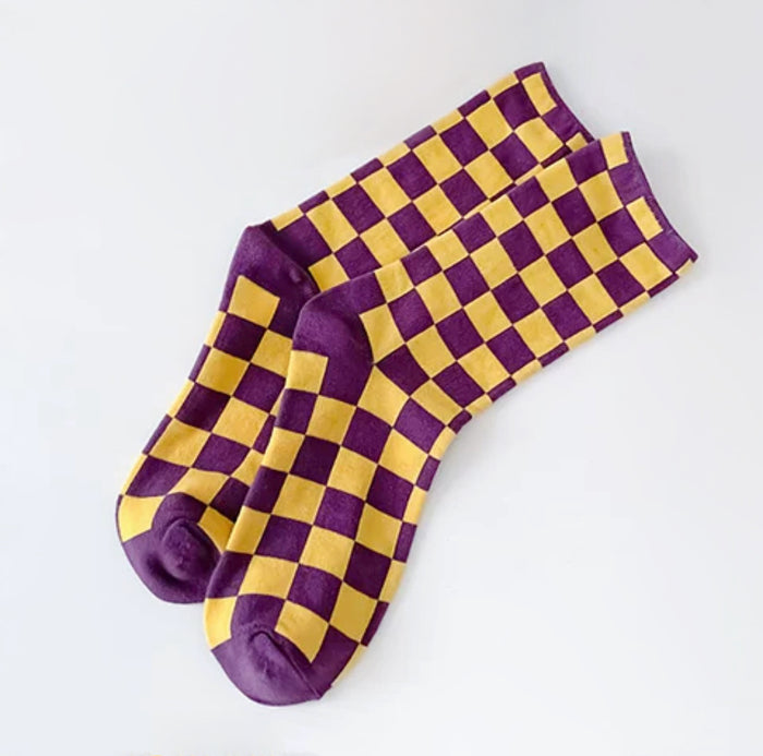 Close-up of Checkerboard Colored Socks in purple, ideal for workouts and commuting.
