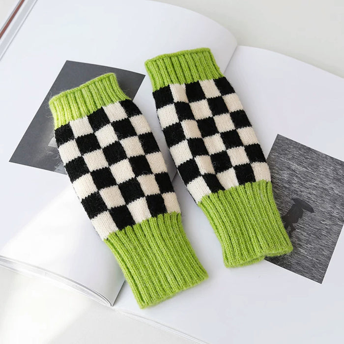 Lime green checkered knit gloves on book; soft texture ideal for cozy reading or student study sessions.