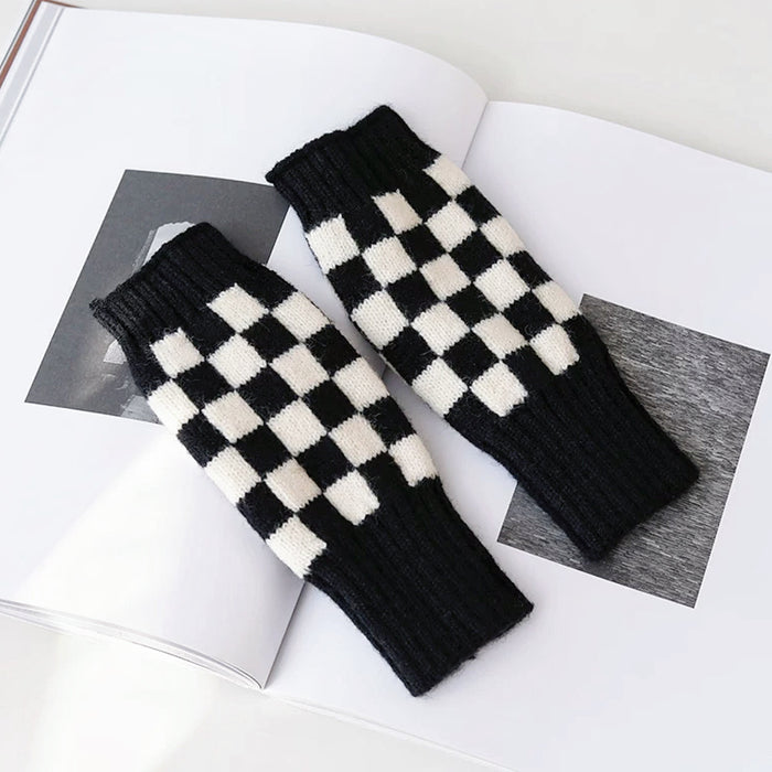 Black and white checkered knit gloves; timeless design perfect for retro-themed winter street styling.