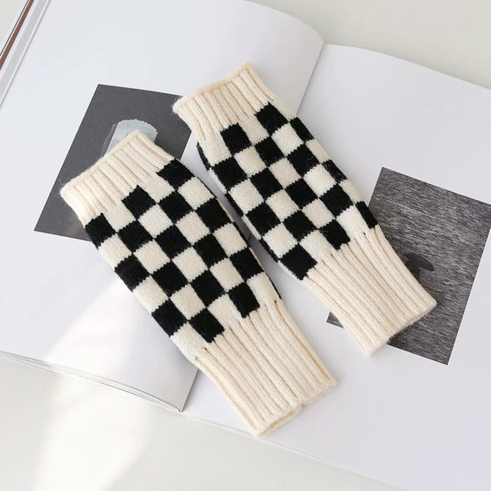 Cream and black checkered gloves; breathable yet warm acrylic knit suited for outdoor walks and hiking.