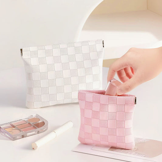 Checkered self-closing storage bags in white and pink; woven checker pattern pouches for makeup and desk storage.