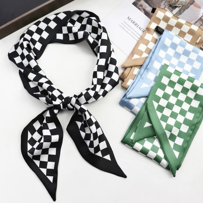 Front view of Black and white checkered silk-like skinny scarf with other color options: blue, green, and tan.