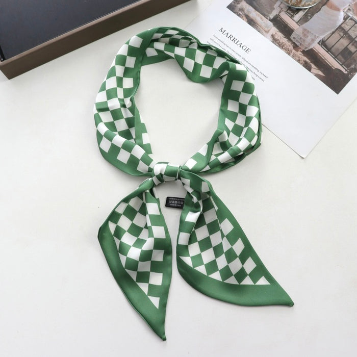 Close-up of Checkered Silk Like Skinny Scarf in green, ideal for everyday styling and weekend outings.