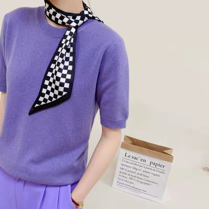 Model wearing a plaid silk scarf in lilac and purple, great for office layering and commuting.